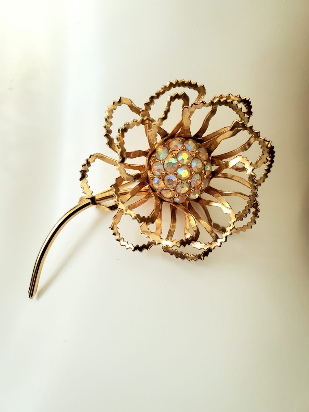Sarah Coventry 1960s  Gold Flower Brooch with Iridescent Crystal Center